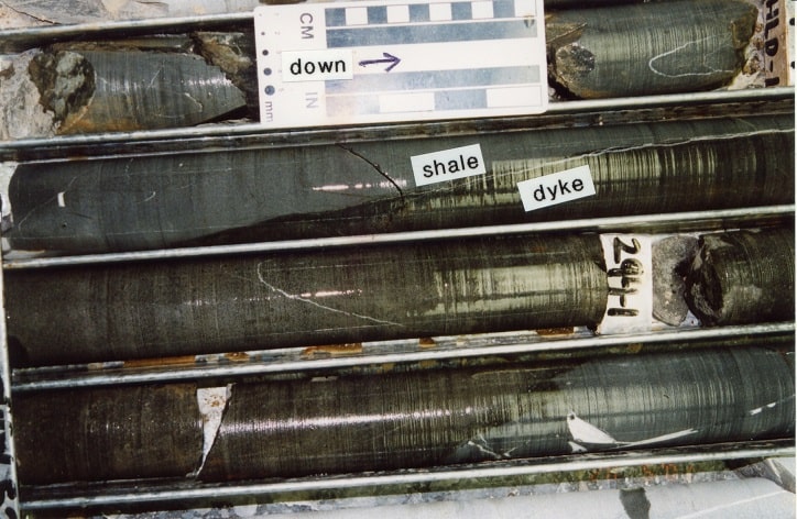 Showing contact of lower melanephelinite dyke and 
      host Tapley Hill Formation shale in drillhole HLD-01